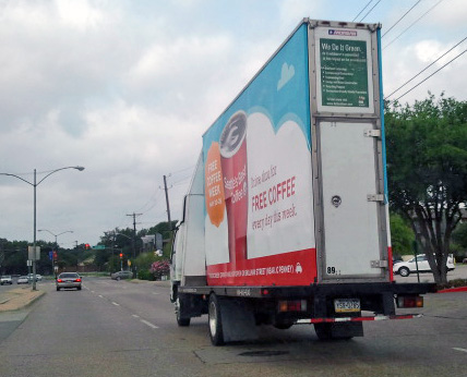 The ad truck drives down Abrams to let neighbors know about Free Coffee Week.