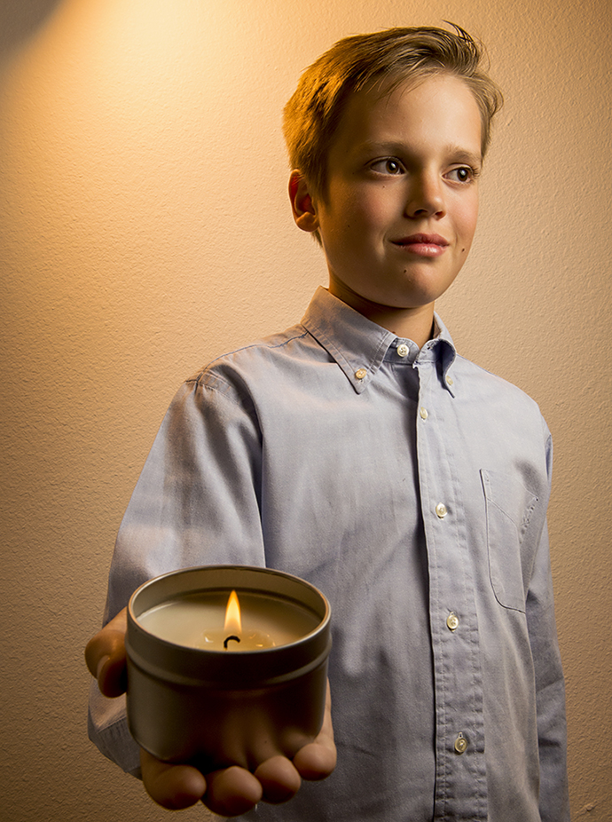Christopher Row 11-year-old candle maker. Photo by Danny Fulgencio