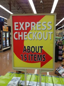 This Kroger sign leading to the express checkout lane seems kind of vague.