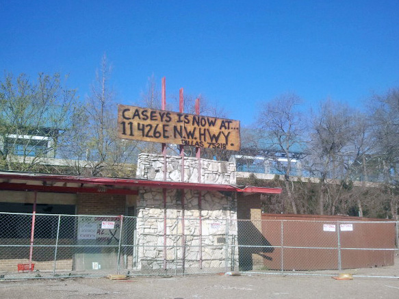 Casey's has vacated the property, but, as the sign reads, they have moved to 11426 E. Northwest.
