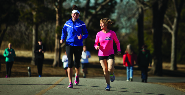 Joyce Kelly (right), who has the neurological disorder CMT, still trains with her running group: Photo by Kim Leeson 