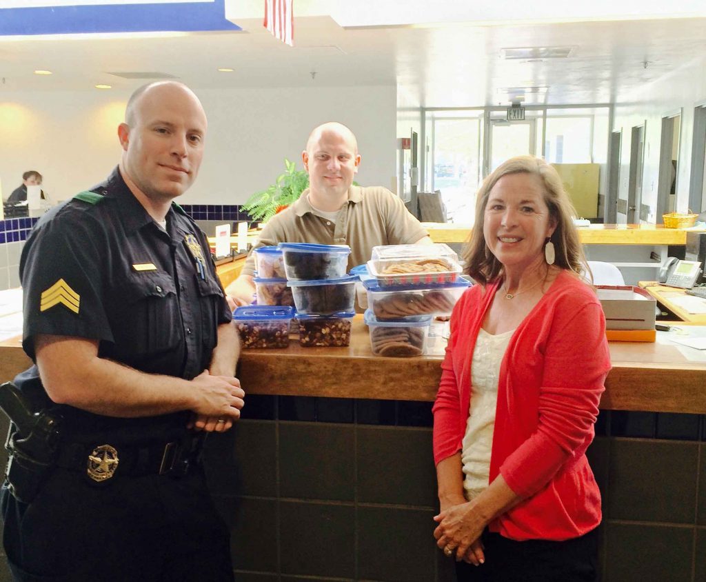 LHWL's Carrie Denson with police at the DPD Northeast Substation