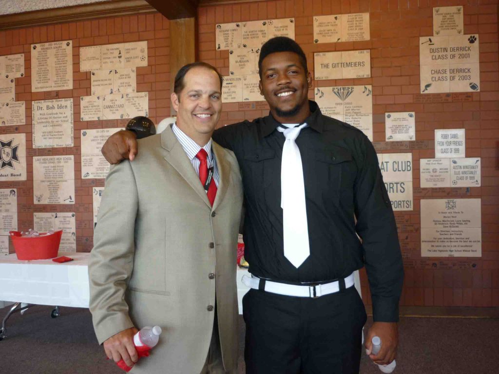 Scott Smith with LHHS player Kent Perkins in 2012. Perkins now plays at UT.