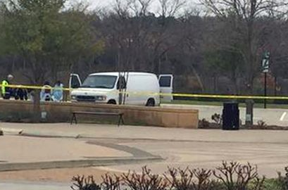 A forensic van parked at the Lake Highlands Town Center 