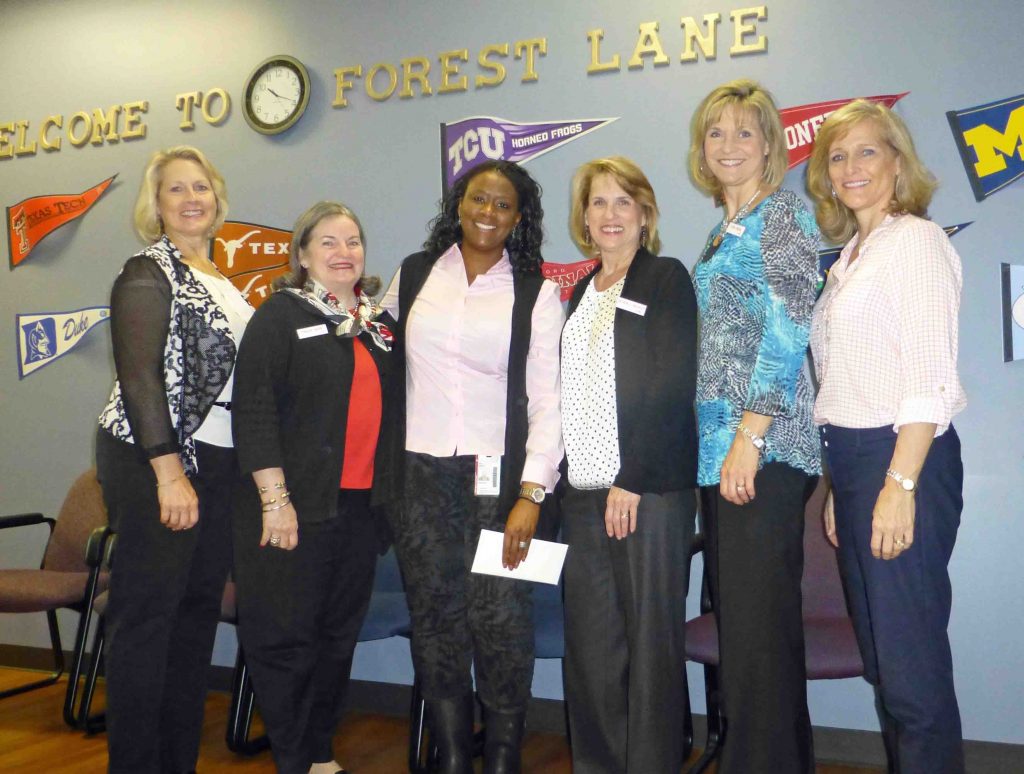 Forest Lane Principal Von Ensley gives LHWL members a tour
