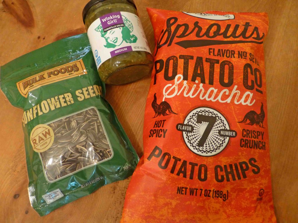 Sprouts label sunflower seeds, and Sriracha chips, Winking Girl salsa