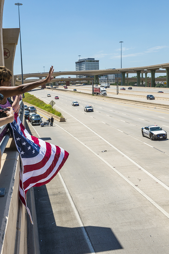 The funeral procession for Dallas Police Sgt. Michael Smith was seen streaming eastbound on Interstate 635 near Schroeder Rd. Photo by Danny Fulgencio