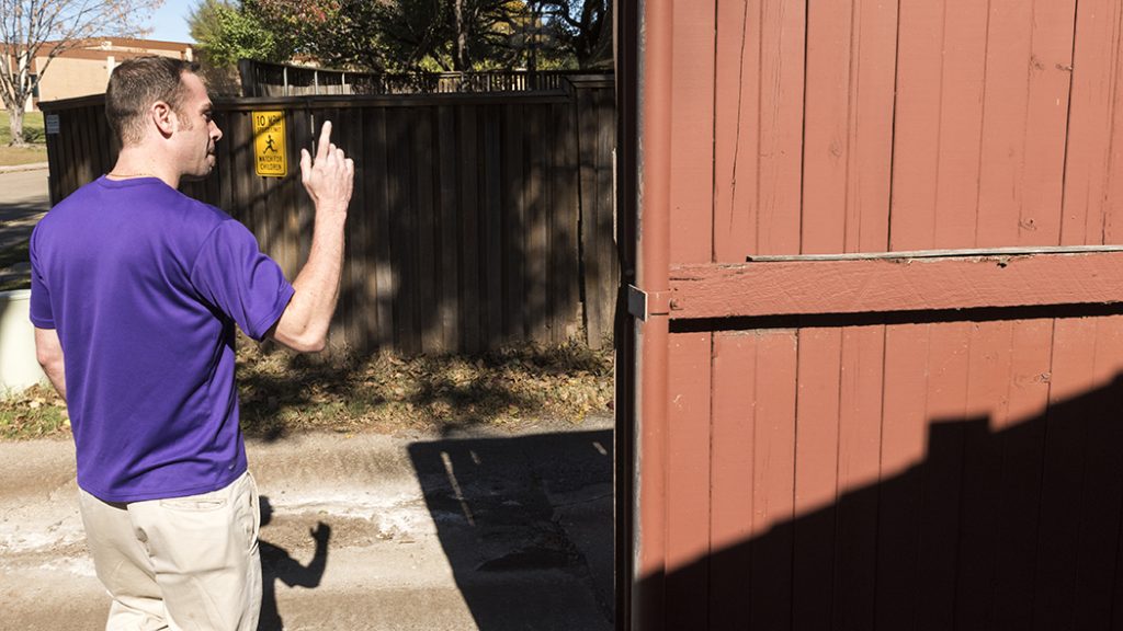 Andre Lanaux shows where he chased the teenage intruder into the alley. (Danny Fulgencio)