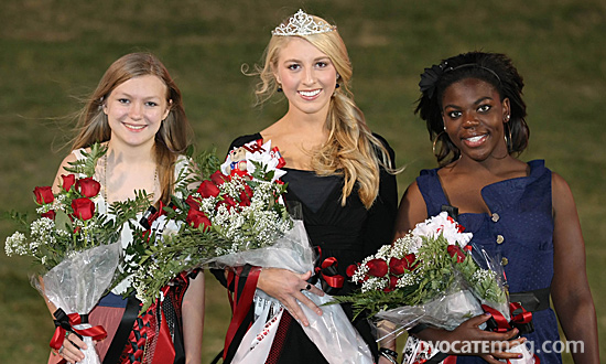 The Lake Highlands High School homecoming queen Sarah Penny (middle) and her court Rachel Lander (left) and Britta Myers (right) were crowned in a pre-game ceremony. David Werther snapped the photo.