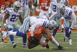 Associated Press photo. Sterling Moore is number 30 on the Cowboys.
