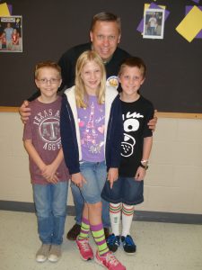 Dr. Jeff Donnell with his fifth grade triplets Will, Kate and John