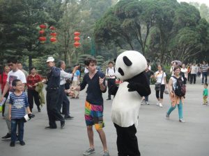 Jake Gaba dances with panda