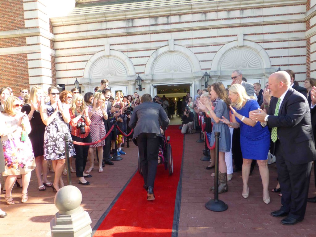 Michael Hood gives his date the red carpet treatment