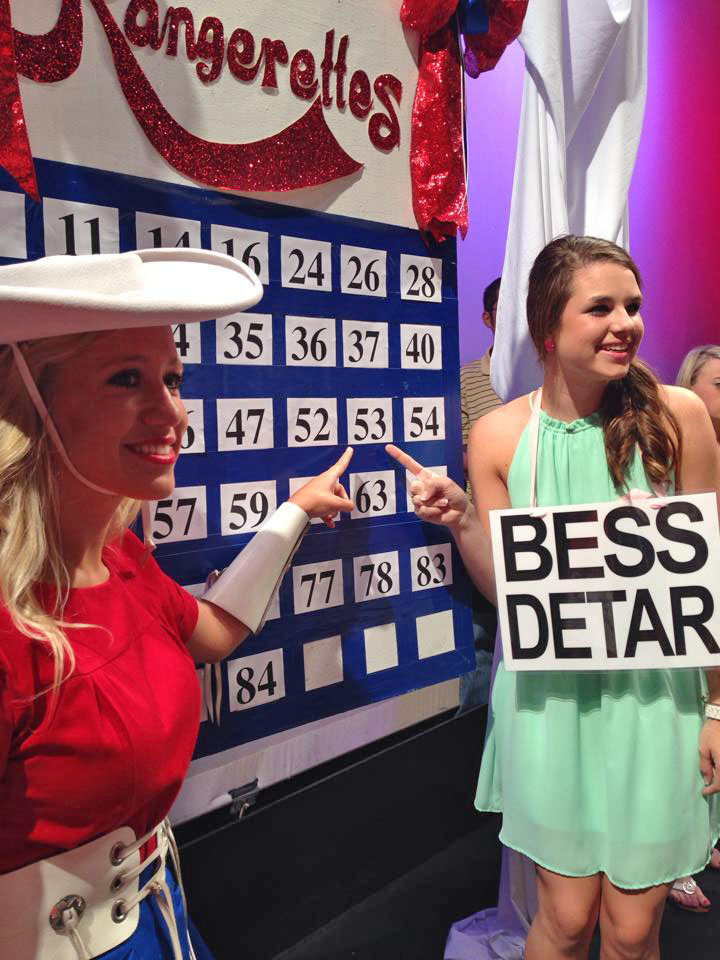 Bess Detar enjoys her "sign drop" moment