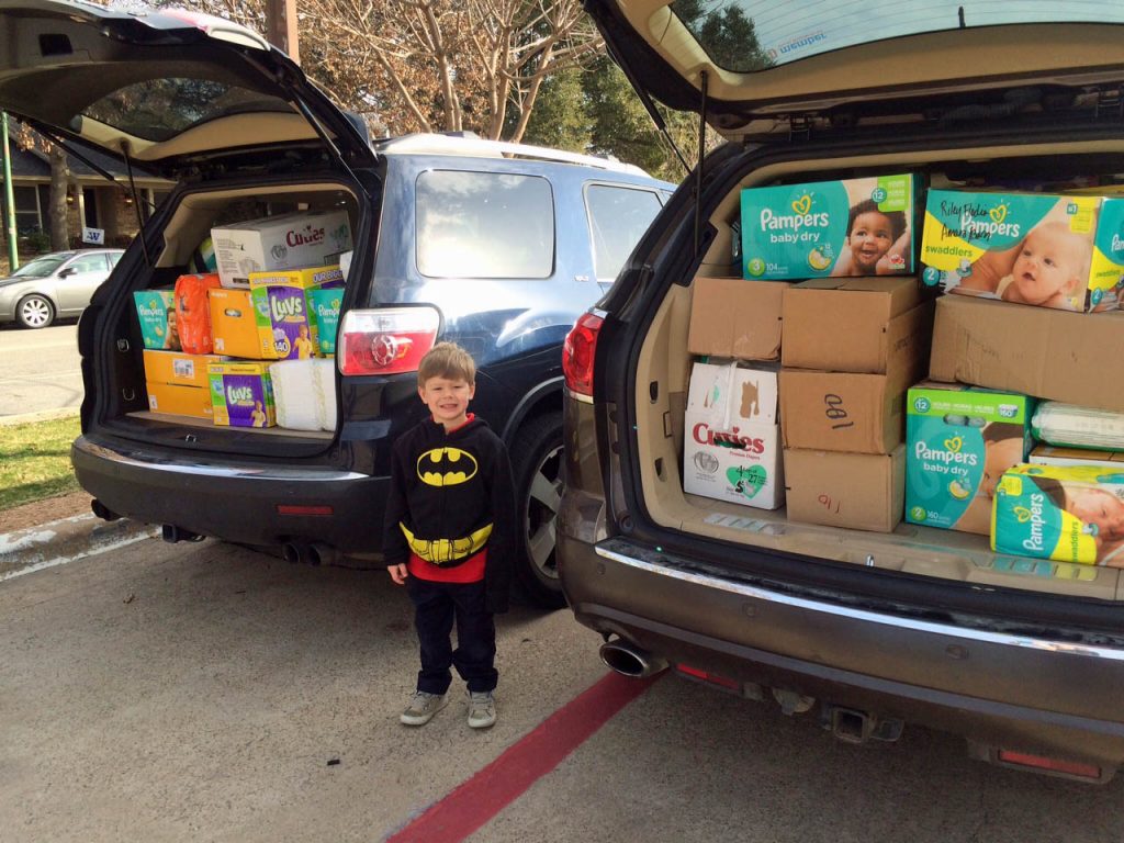 Slade Meierhofer helps with diaper collection at Moss Haven 