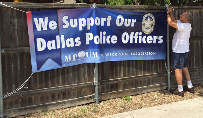Dallas Police Department photo of Lake Highlands residents posting a police appreciation banner.