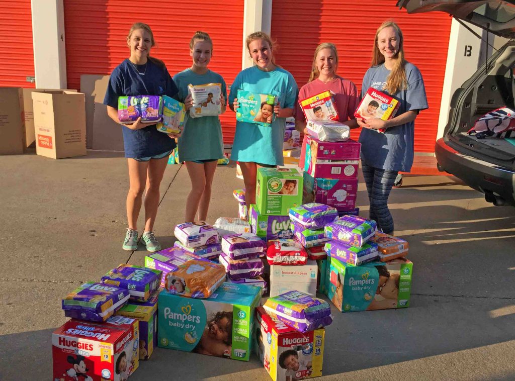 Caroline Lewis, Megan Brady, Lauren Brunkenhoefer, Lauren Urban and Emily Luedke helped deliver the diapers.