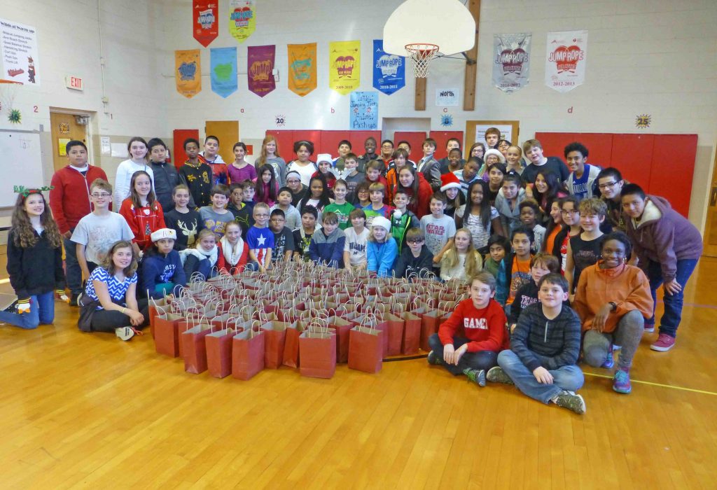 LHE students pose with their Promise House packs