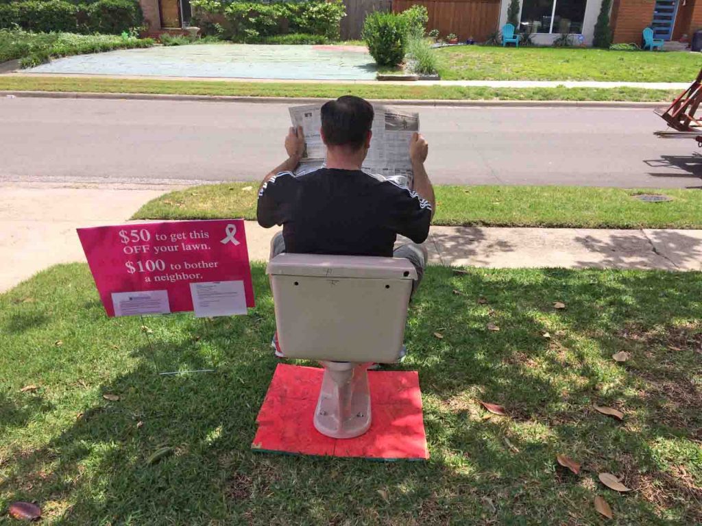Todd Overstreet makes use of the pink potty in his yard