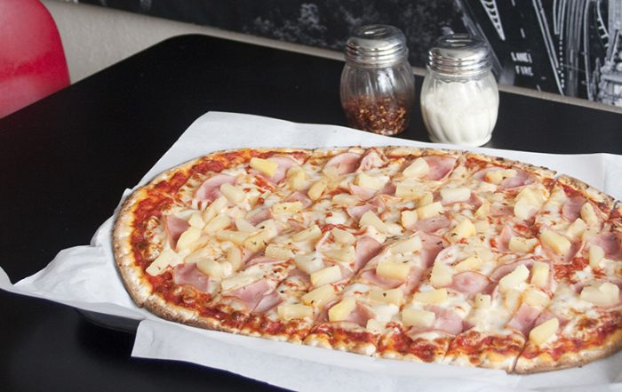 Canadian bacon pineapple pizza at Atomic Pie (Photo by Lori Bandi)