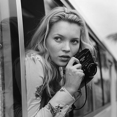 Kate Moss with Holga camera (Photo by Brian Weber via Dallas Contemporary)