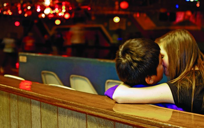 Love blooms at the roller rink. (Photo by Danny Fulgencio)