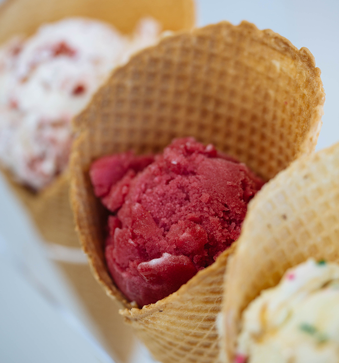 Scoops of pomegranate and red velvet. (Photo by Kathy Tran)