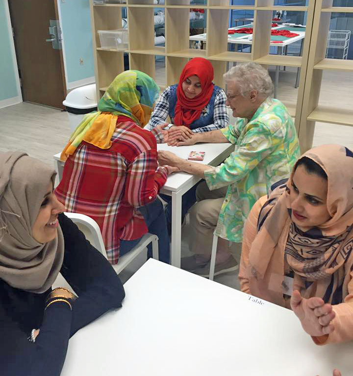 Refugee women with a mentor at Vickery Trading Company
