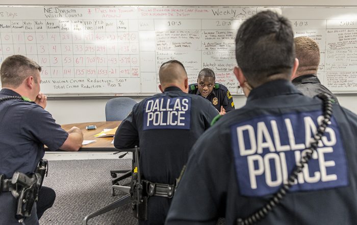 Police officers Lacie Darnell and Scot Ansley service Northeast Dallas. Over the course of four hours, the officers responded to a suspected domestic dispute, a reported robbery, a disturbing the peace call and a report of assault and public intoxication. Photo by Danny Fulgencio