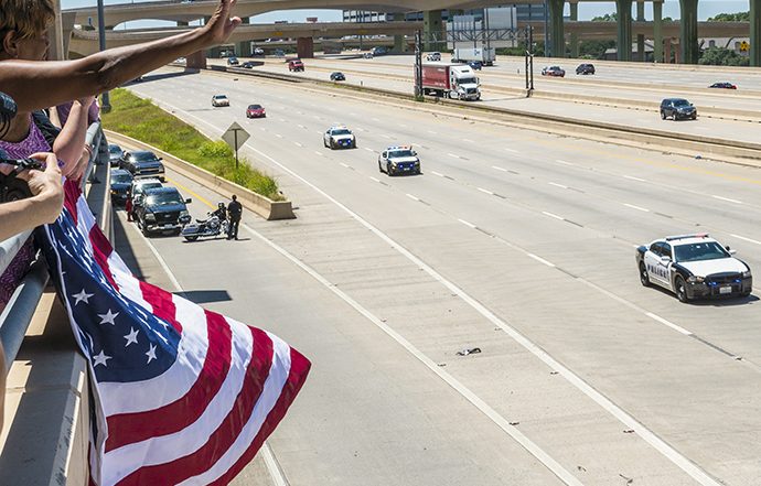 The funeral procession for Dallas Police Sgt. Michael Smith was seen streaming eastbound on Interstate 635 near Schroeder Rd. Photo by Danny Fulgencio