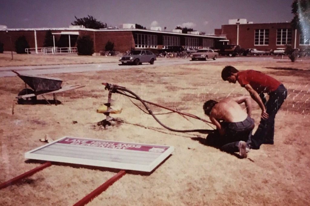Volunteers post Lake Highlands Elementary School's new sign in 1985. (Photo courtesy of Lake Highlands Elementary) 
