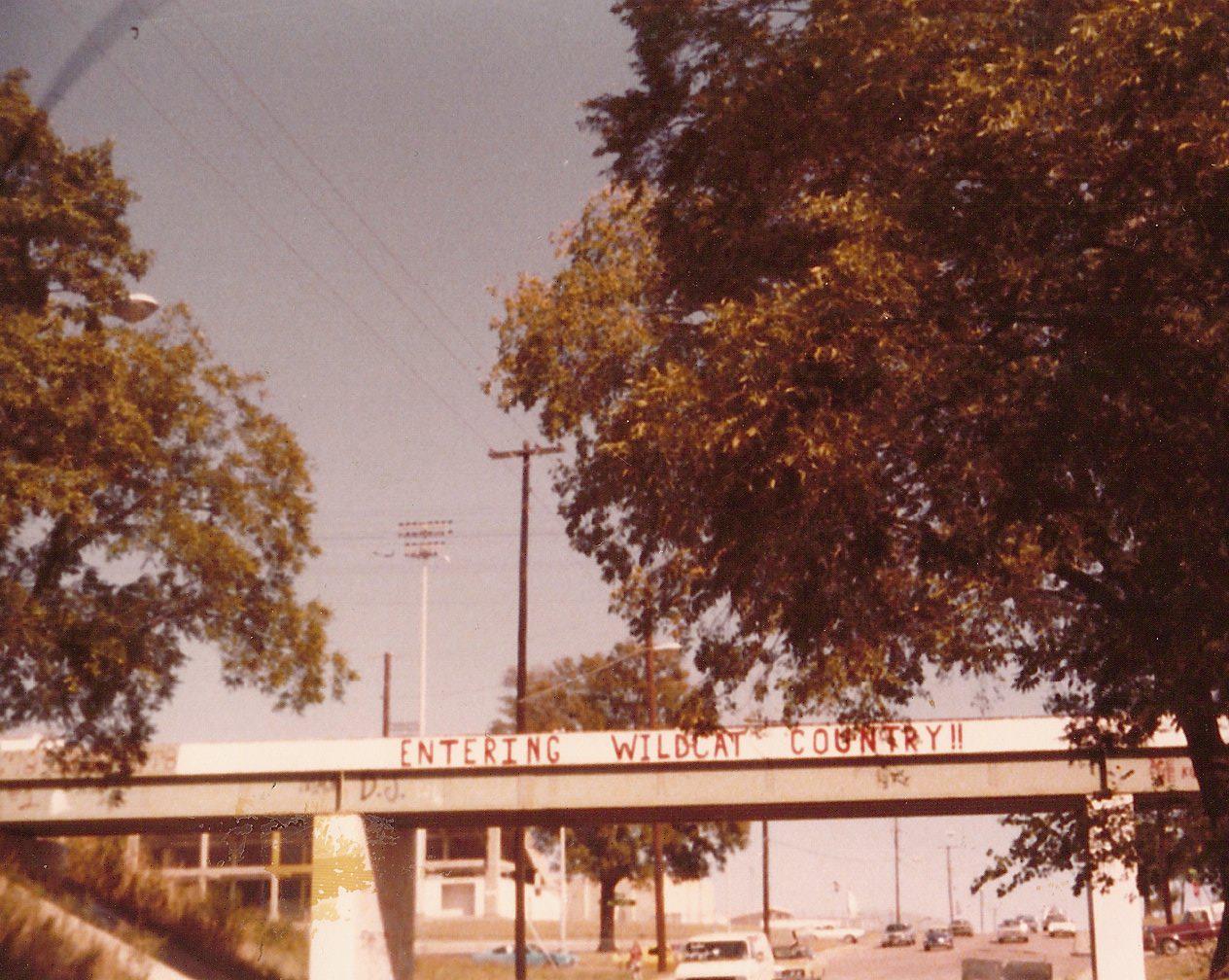 painting the railroad trestle over White Rock Trail became a senior class tradition at Lake Highlands High School in the 1960s after the city widened and paved Church Street. Each senior class was allowed to paint its own message, pictured here in 1986. The tradition ended in the early 2000s at the request of the city. (Photo courtesy of Gayle Schultz).