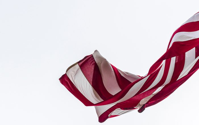 American flag in the wind Flagpole Hill. Photo by DannyFulgencio