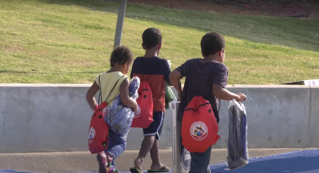 WATCH More than 5,000 backpacks distributed at RISD back to school