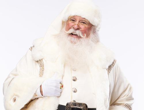Claus for celebration: NorthPark Center Santa sings and plays guitar
