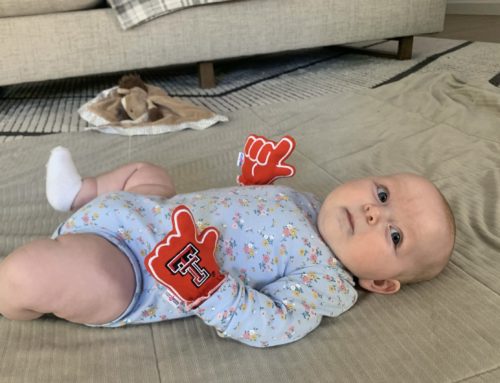 Local dads start company selling college-themed baby mittens