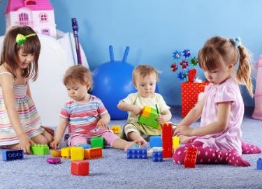 bigstock-Group-of-kids-playing-with-con-12140777-2